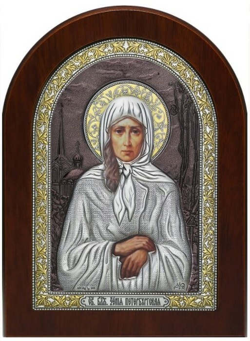 Icon "Saint Xenia of St. Petersburg" colored brown lacquer