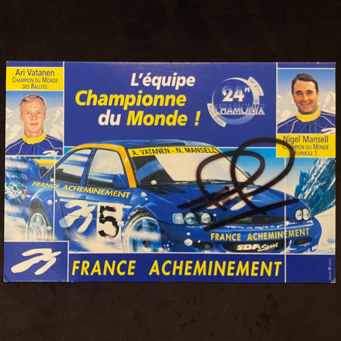 An autographed card of racing driver Nigel Mansell