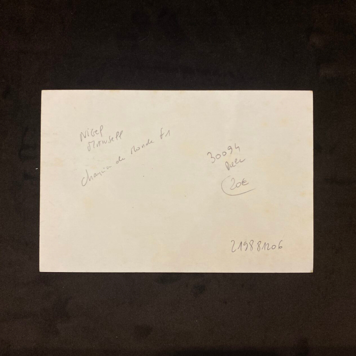 An autographed card of racing driver Nigel Mansell