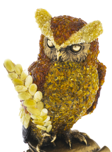 Amber sculpture "Owl with a feather"