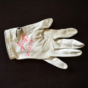 An autographed glove by golfer Sofia Anokhina