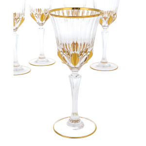 A set of gilded wine glasses for 6 people