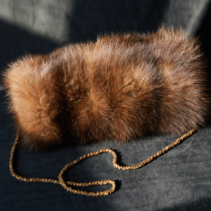 Sable fur clutch, gold pendant