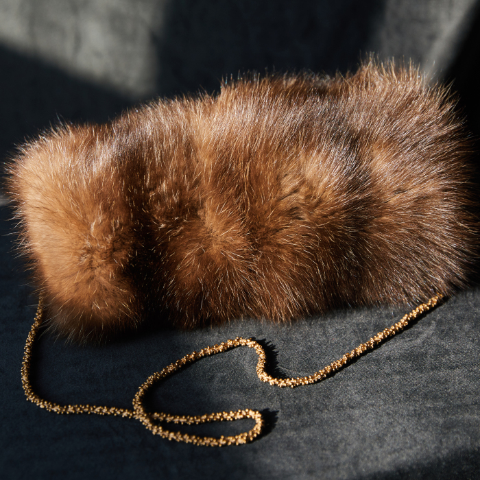 Sable fur clutch, gold pendant