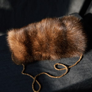 Sable fur clutch, gold pendant