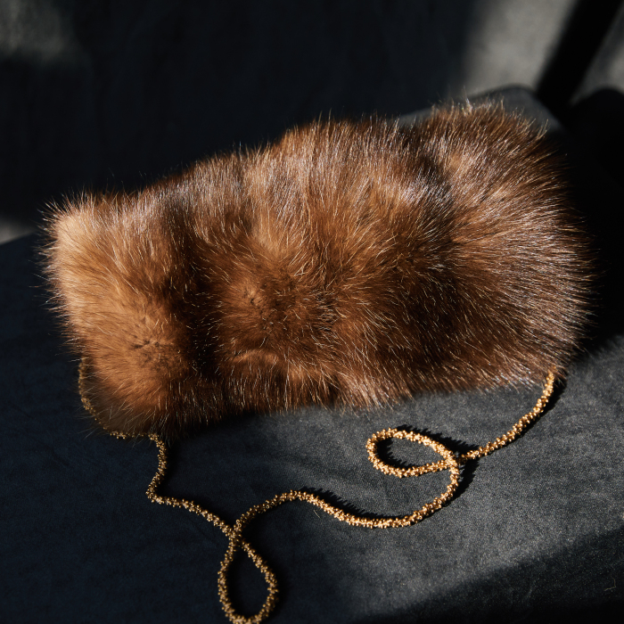 Sable fur clutch, gold pendant