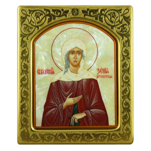 The icon with mother-of-pearl "Xenia of St. Petersburg" in a gold frame with embossing