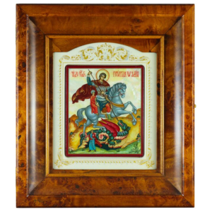 The icon of St. George the Victorious in a kiosk on natural mother-of-pearl