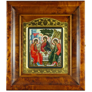 Icon of the Holy Trinity in a gold frame and a kiosk on natural mother-of-pearl