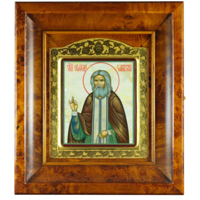 The icon "Seraphim of Sarov" in a gold frame and a kiosk on natural mother-of-pearl