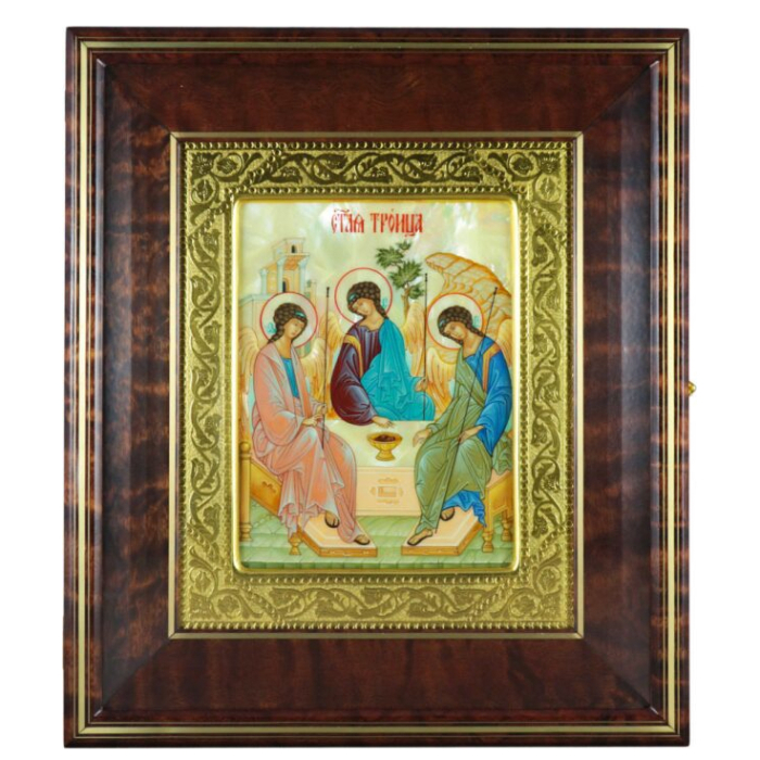 Icon of the Holy Trinity in a kiosk and a gold frame on natural mother-of-pearl