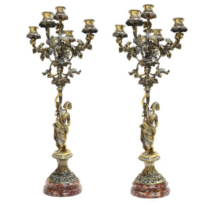 A pair of bronze candelabra "Diana" on a crenoid