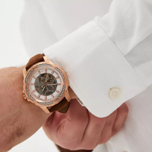 Mikhail Moskvin "Elegance" self-winding mechanical wristwatch in gold with a brown strap