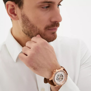 Mikhail Moskvin "Elegance" self-winding mechanical wristwatch in gold with a brown strap