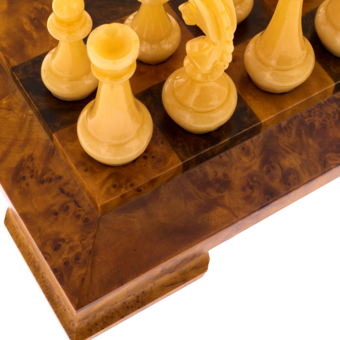 Cap chess with amber pieces