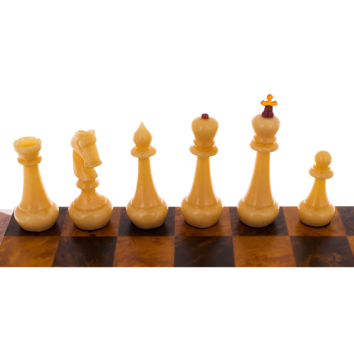 Cap chess with amber pieces