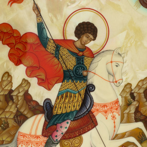 The icon of St. George the Victorious on natural mother-of-pearl in a gold frame