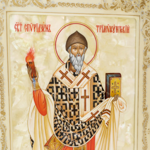 Icon on natural mother-of-pearl "Spyridon of Trimifunt" in a kiosk and a white frame