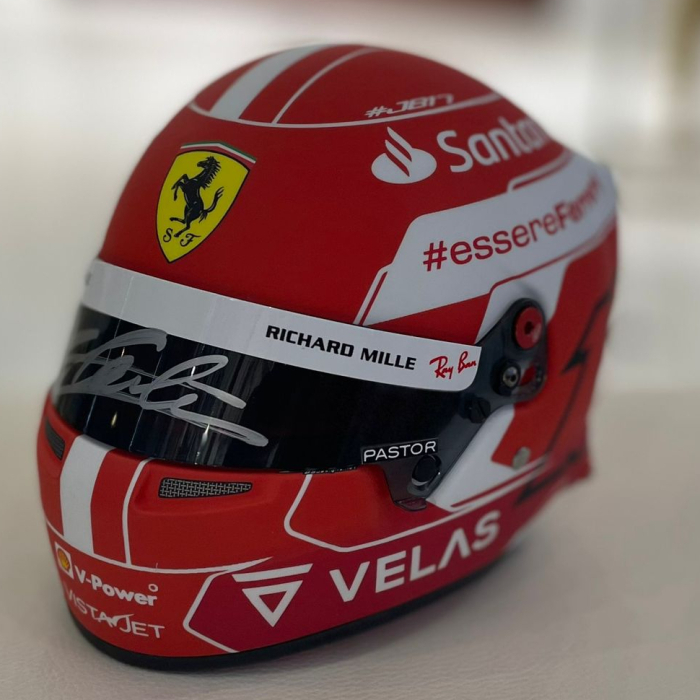 A mini helmet autographed by racing driver Charles Leclair