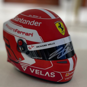 A mini helmet autographed by racing driver Charles Leclair
