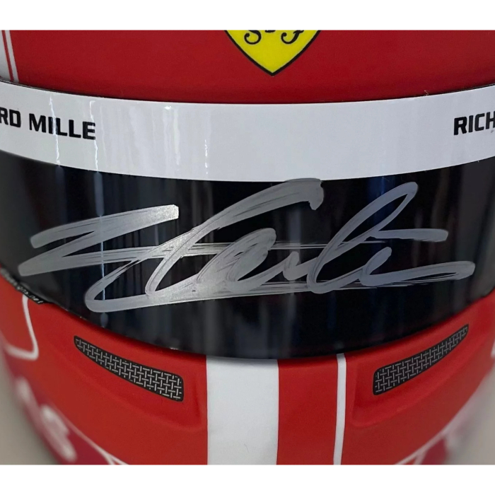 A mini helmet autographed by racing driver Charles Leclair