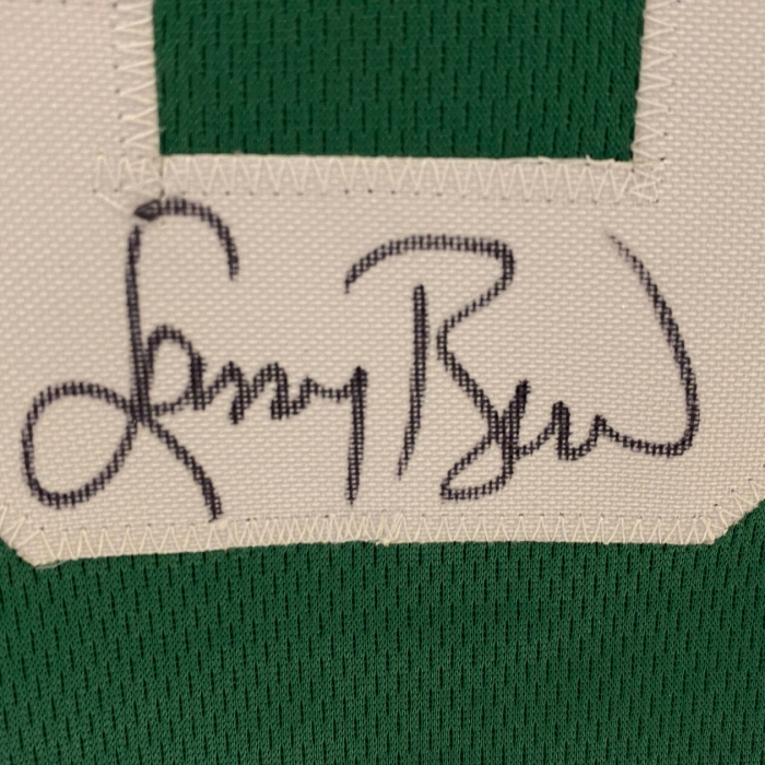 An autographed T-shirt by basketball player Larry Bird